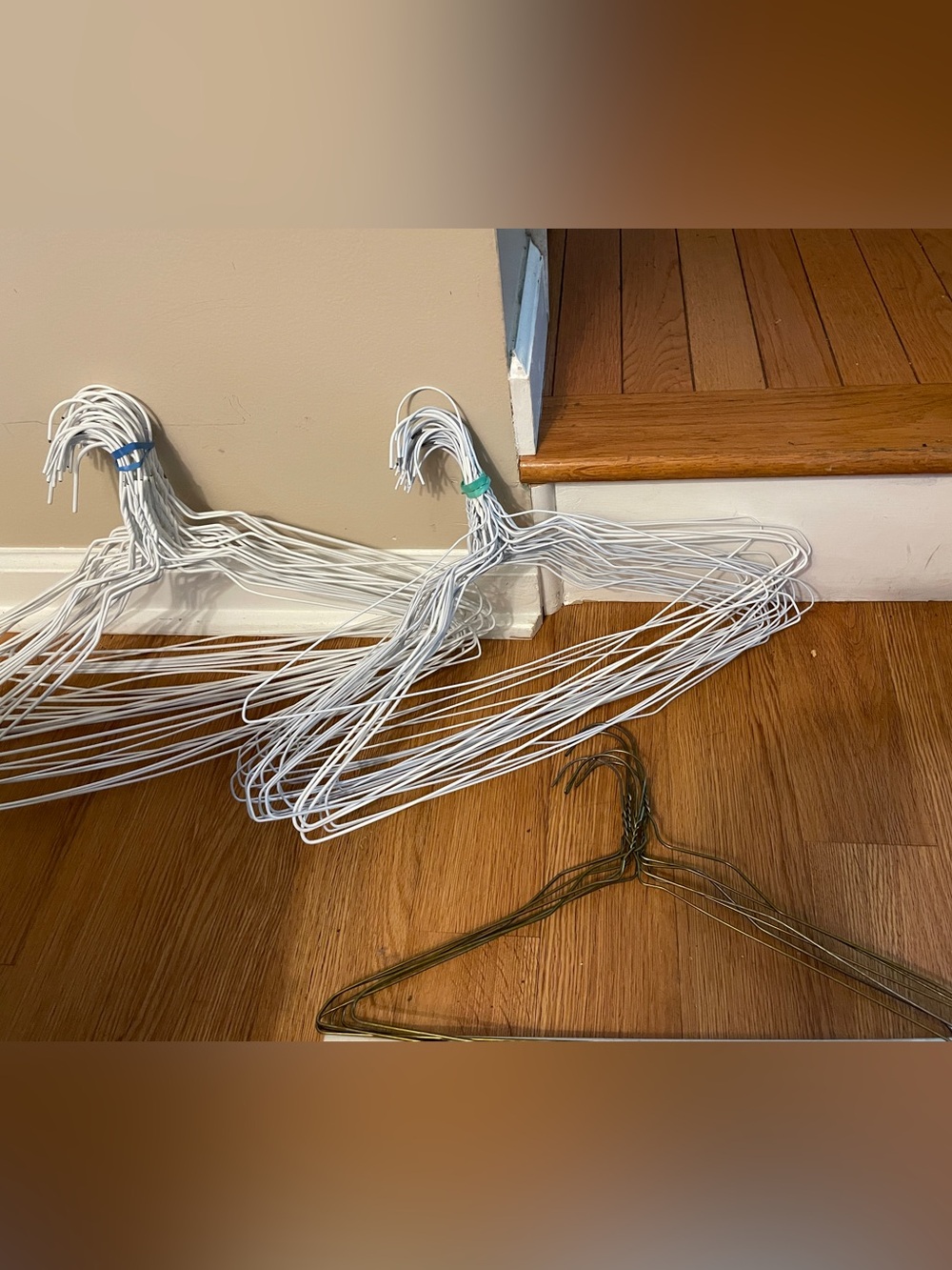 Pack of White Wire Clothing Hangers with Bronze Accent Hanger
